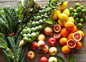a group of fruits and vegetables on a wood surface Healthy Weight Loss Diets Hertford